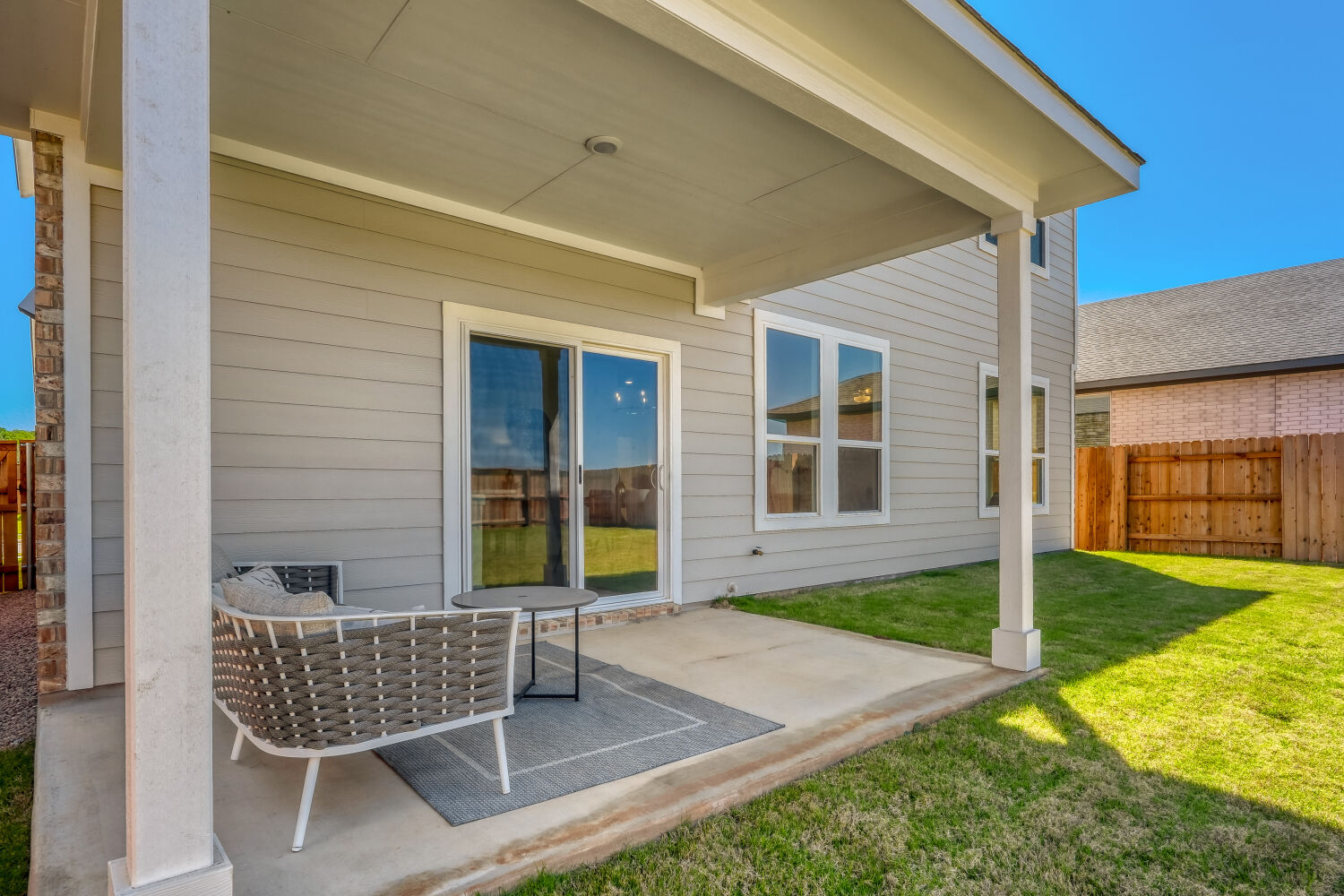 141 Sincere Drive Kyle, TX 78640 - Photo 23 of 23 a backyard of a house with seating space
