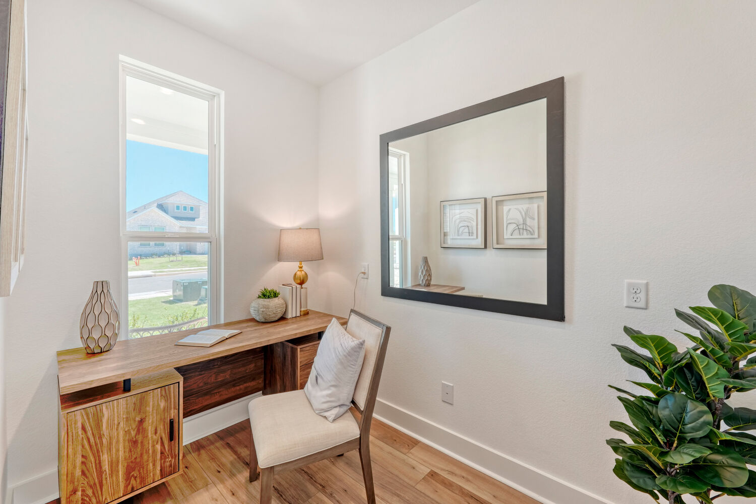 141 Sincere Drive Kyle, TX 78640 - Photo 9 of 23 a dining room with furniture and wooden floor