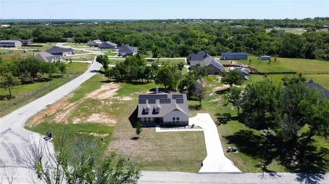 a view of a garden with a lake