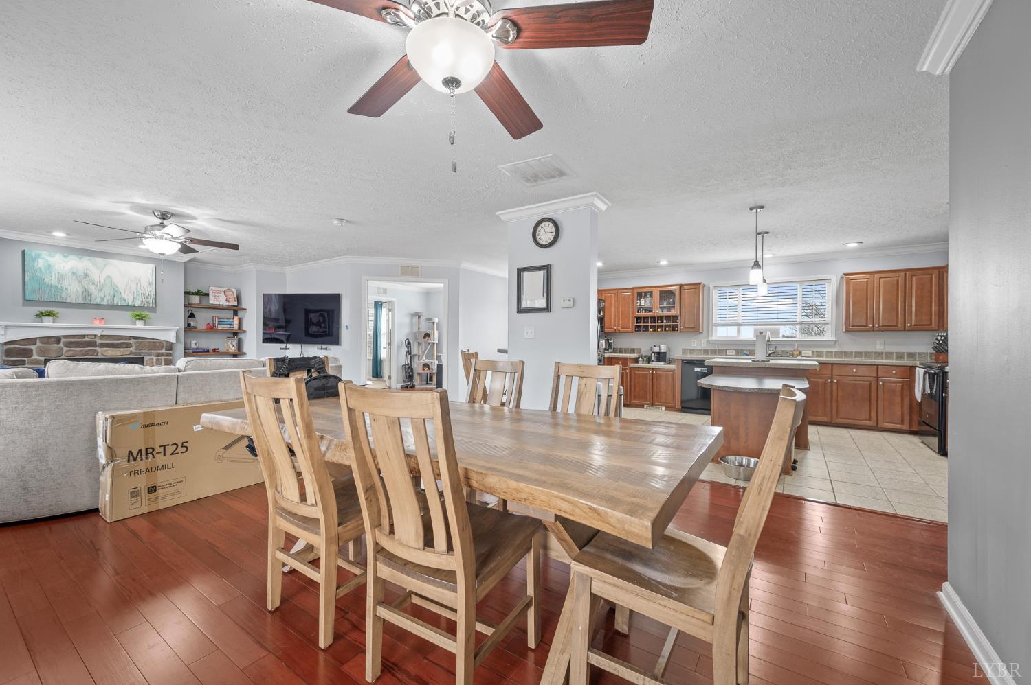 1689 Otter Hill Road Bedford, VA 24523 - Photo 28 of 45 a dining room with stainless steel appliances kitchen island granite countertop a table and chairs