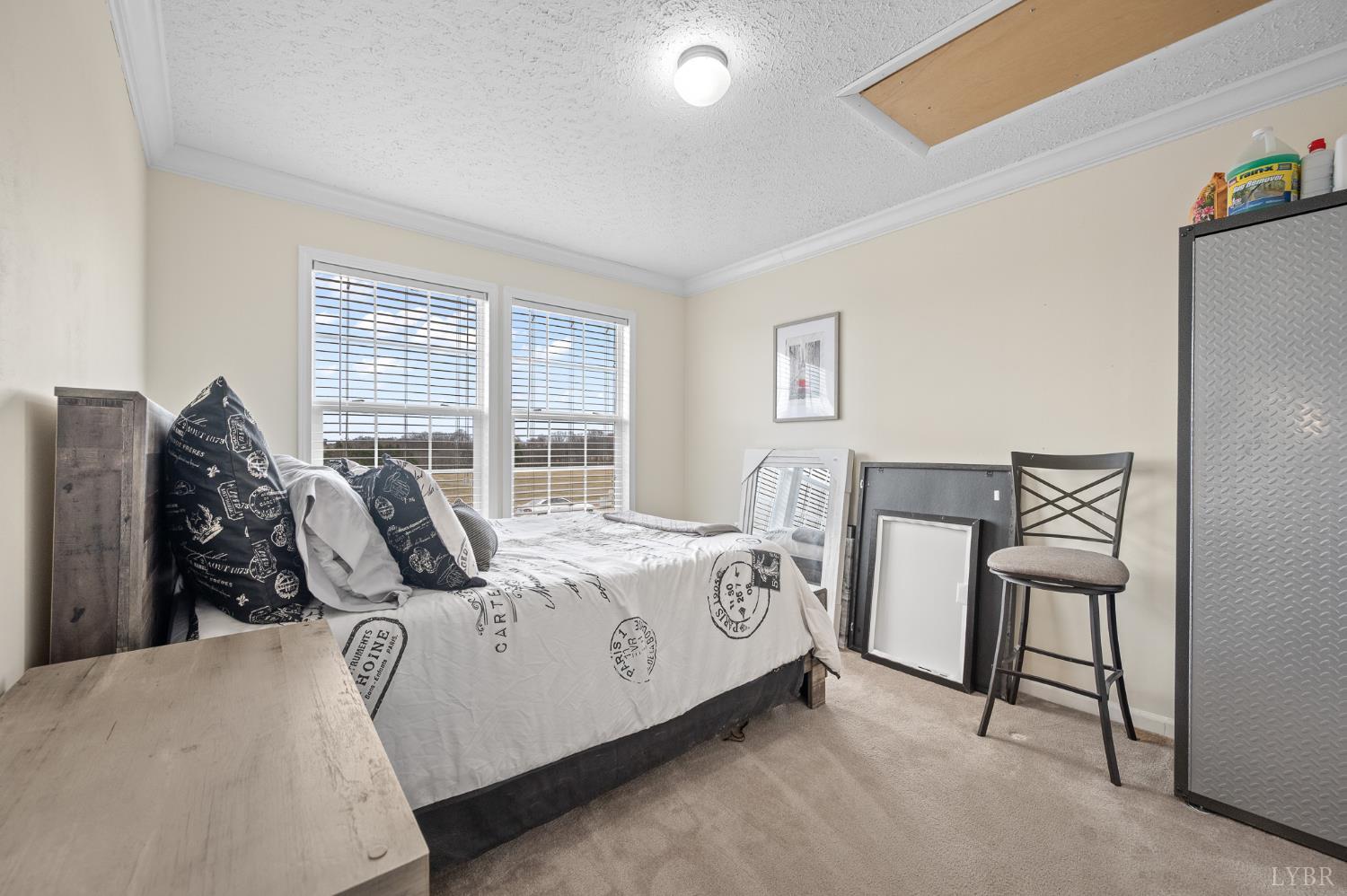 1689 Otter Hill Road Bedford, VA 24523 - Photo 44 of 45 a bed room with a bed and a chair