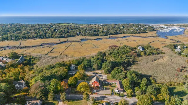an aerial view of beach and residential space