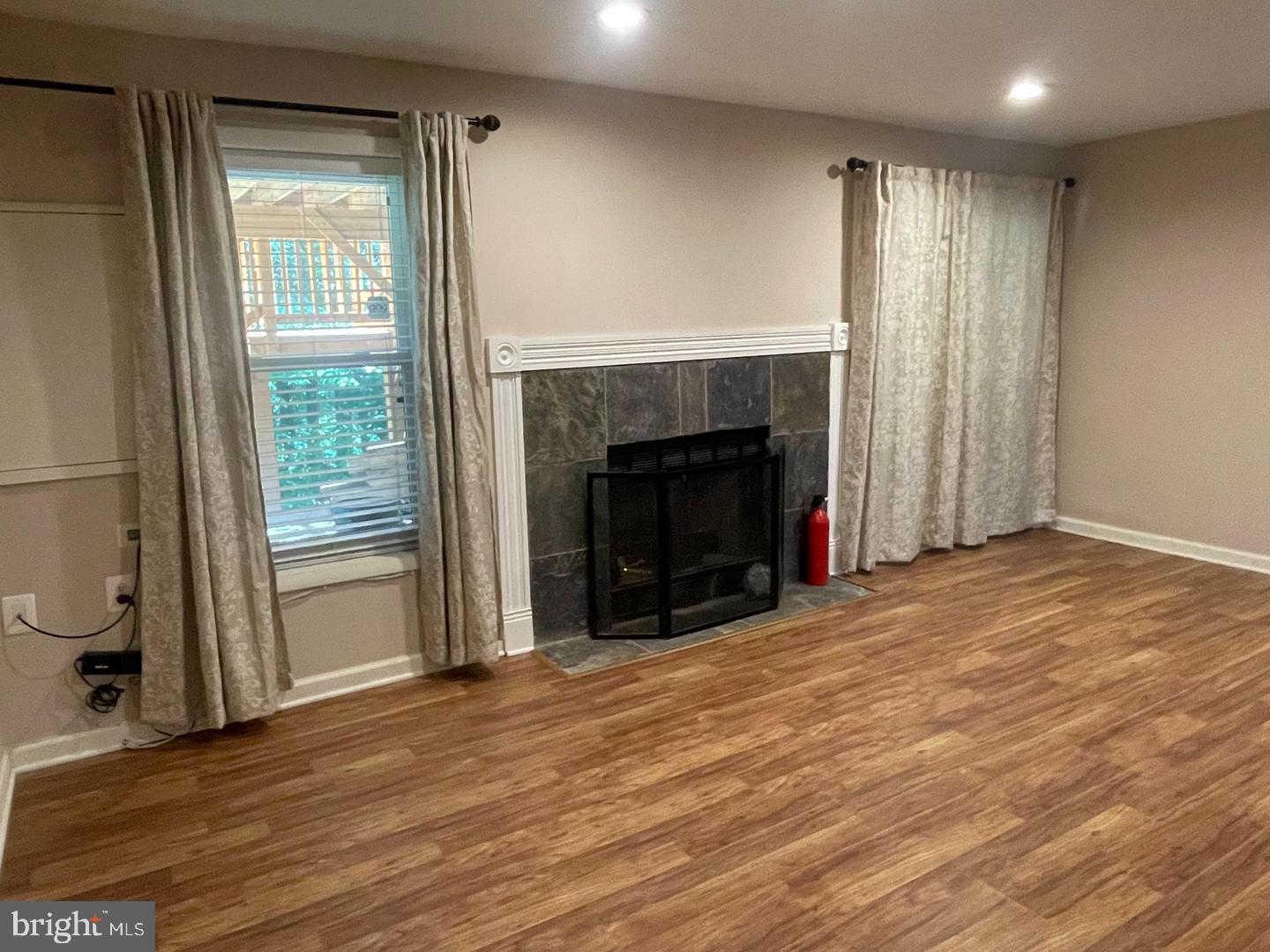6223 Rathlin Drive Springfield, VA 22152 - Photo 23 of 32 Rec room and frpl