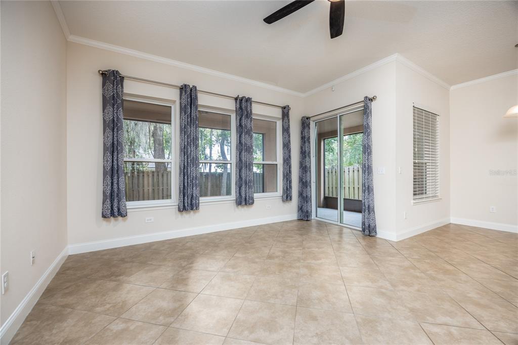 8216 Northwest 54th Street Gainesville, FL 32653 - Photo 24 of 58 a view of an empty room with windows