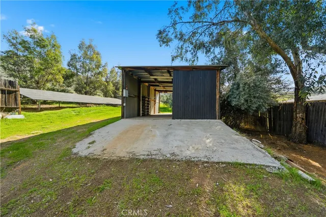 a view of a swimming pool with a patio