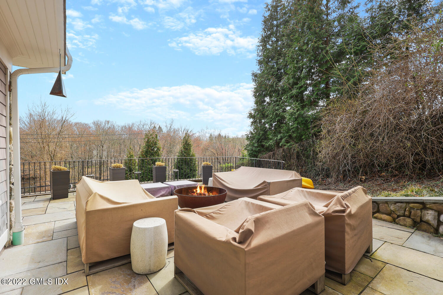 318 Valley Road Cos Cob, CT 06807 - Photo 22 of 33 a view of a roof deck with couches and wooden fence