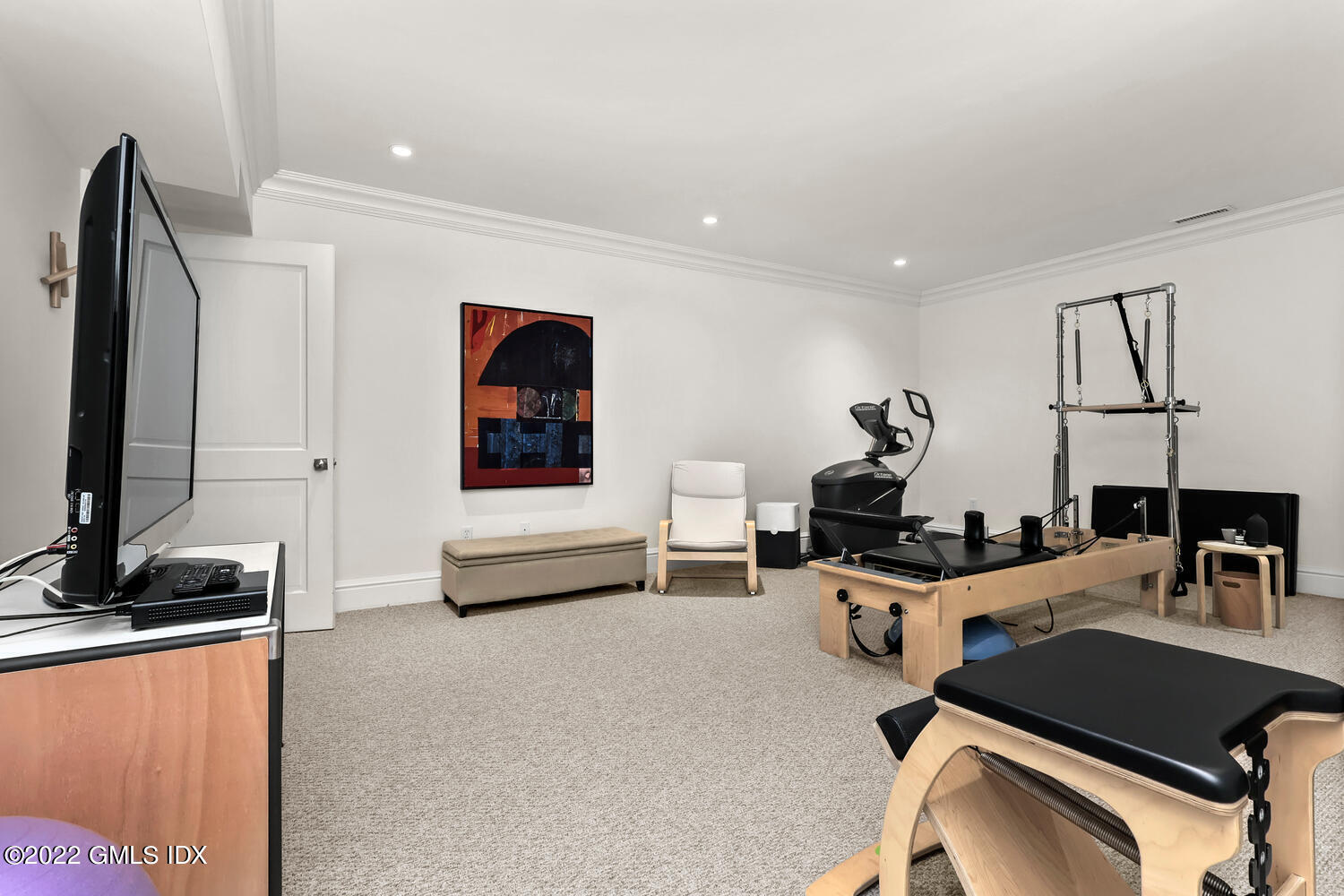 318 Valley Road Cos Cob, CT 06807 - Photo 27 of 33 a living room with furniture and a flat screen tv