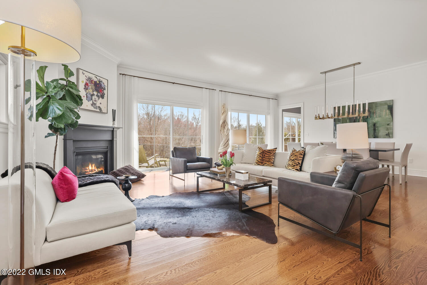 318 Valley Road Cos Cob, CT 06807 - Photo 6 of 33 a living room with furniture fireplace and a large window