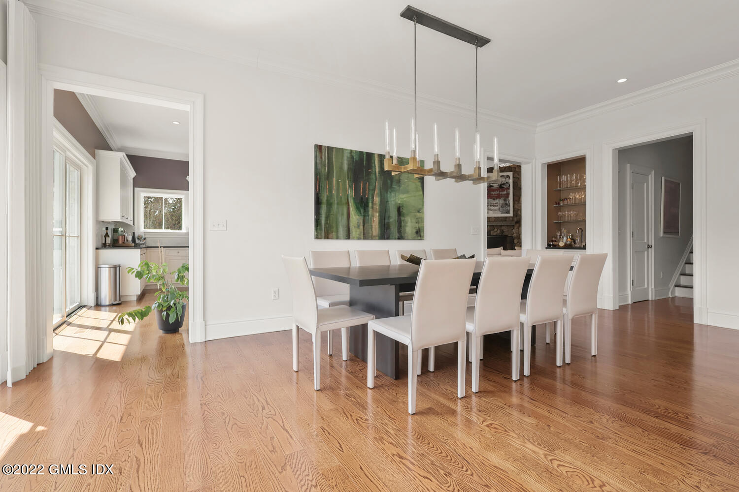 318 Valley Road Cos Cob, CT 06807 - Photo 8 of 33 a view of a dining room with furniture and wooden floor