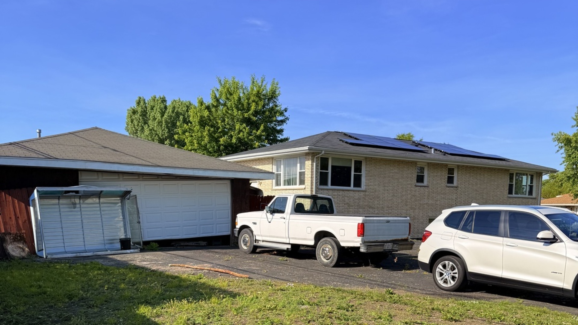 8356 South 78th Avenue Bridgeview, IL 60455 - Photo 33 of 39 a car parked in front of a house