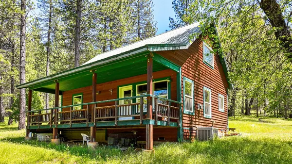 a view of backyard with deck