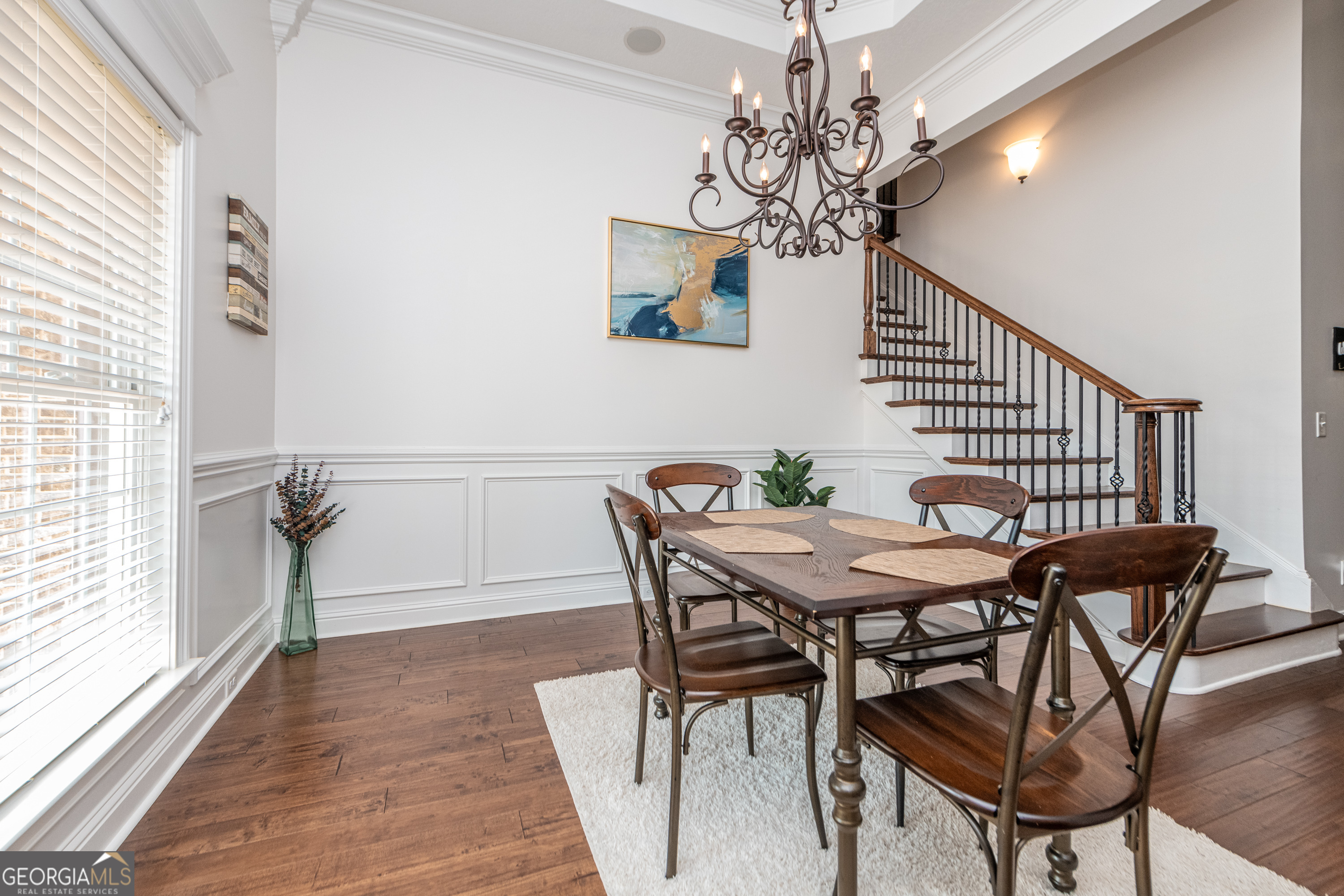 405 Old Bridge Road Warner Robins, GA 31088 - Photo 7 of 55 a view of a dining room with furniture and chandelier