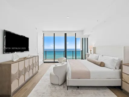 a bedroom with furniture and a couch