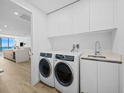 a view of a swimming pool with a balcony