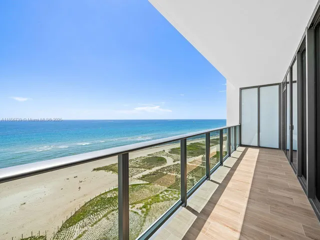 a view of balcony with wooden floor