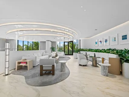 a view of a patio with a table and chairs with wooden floor