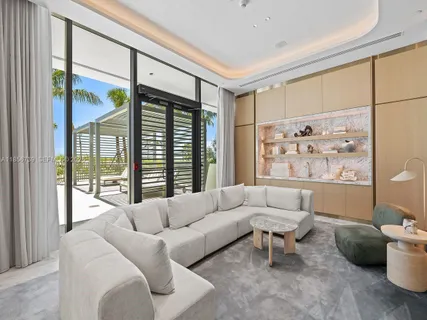 a view of livingroom with furniture and window