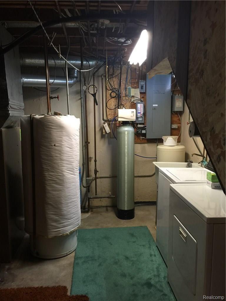10735 Roberts Road Stockbridge, MI 49285 - Photo 17 of 34 Laundry/Mechanicals in the basement.