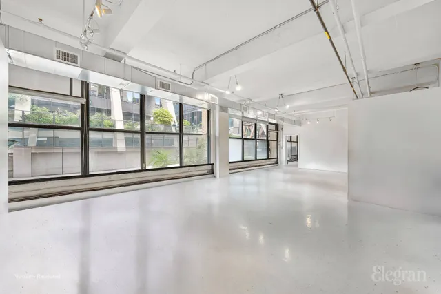 a picture of a bathroom with a shower