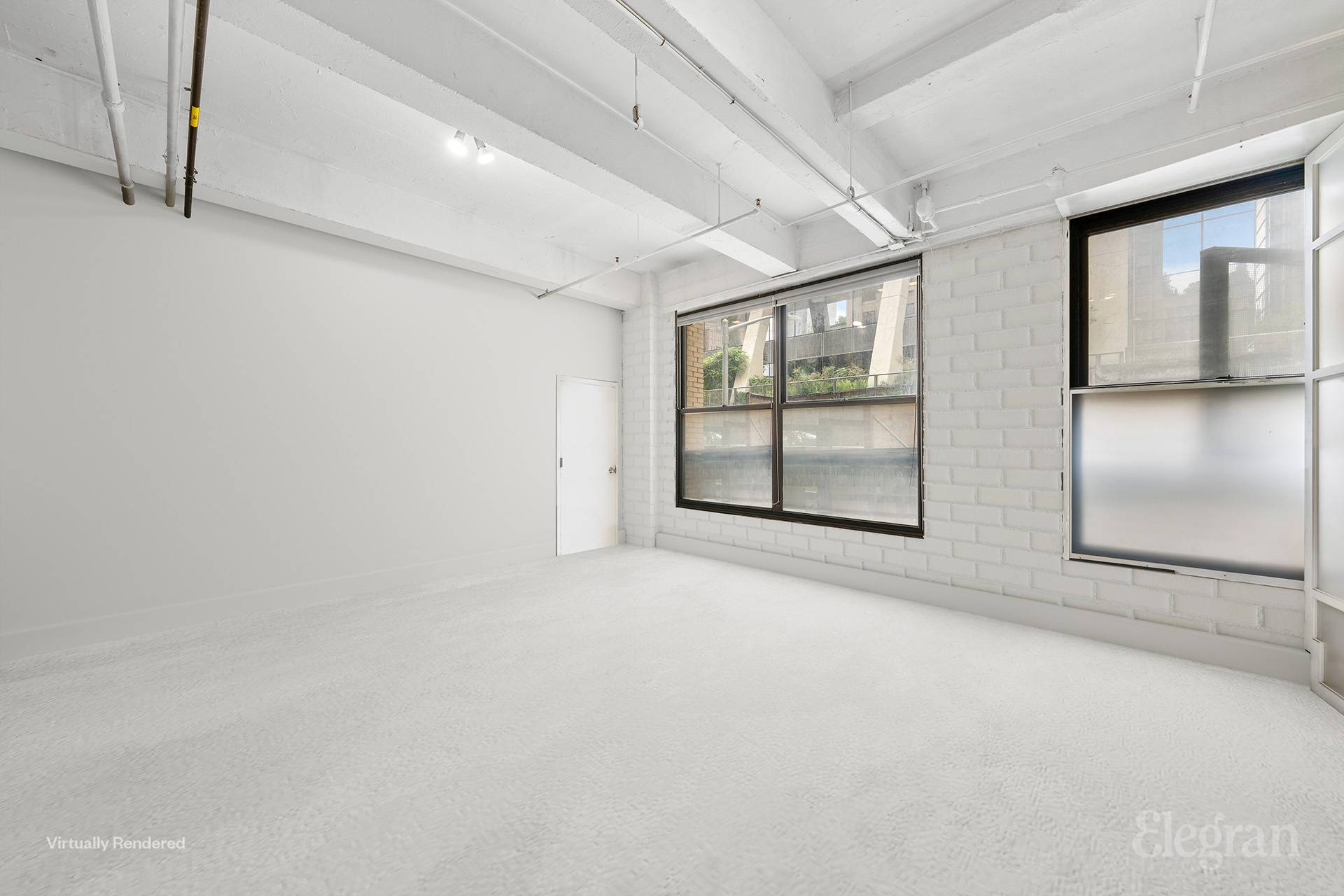 450 West 31st Street, Unit 2N Manhattan, NY 10001 - Photo 4 of 22 an empty room with windows