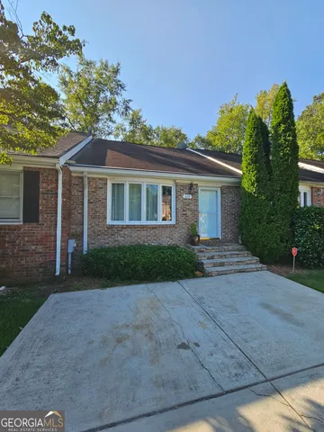 front view of a house and a yard