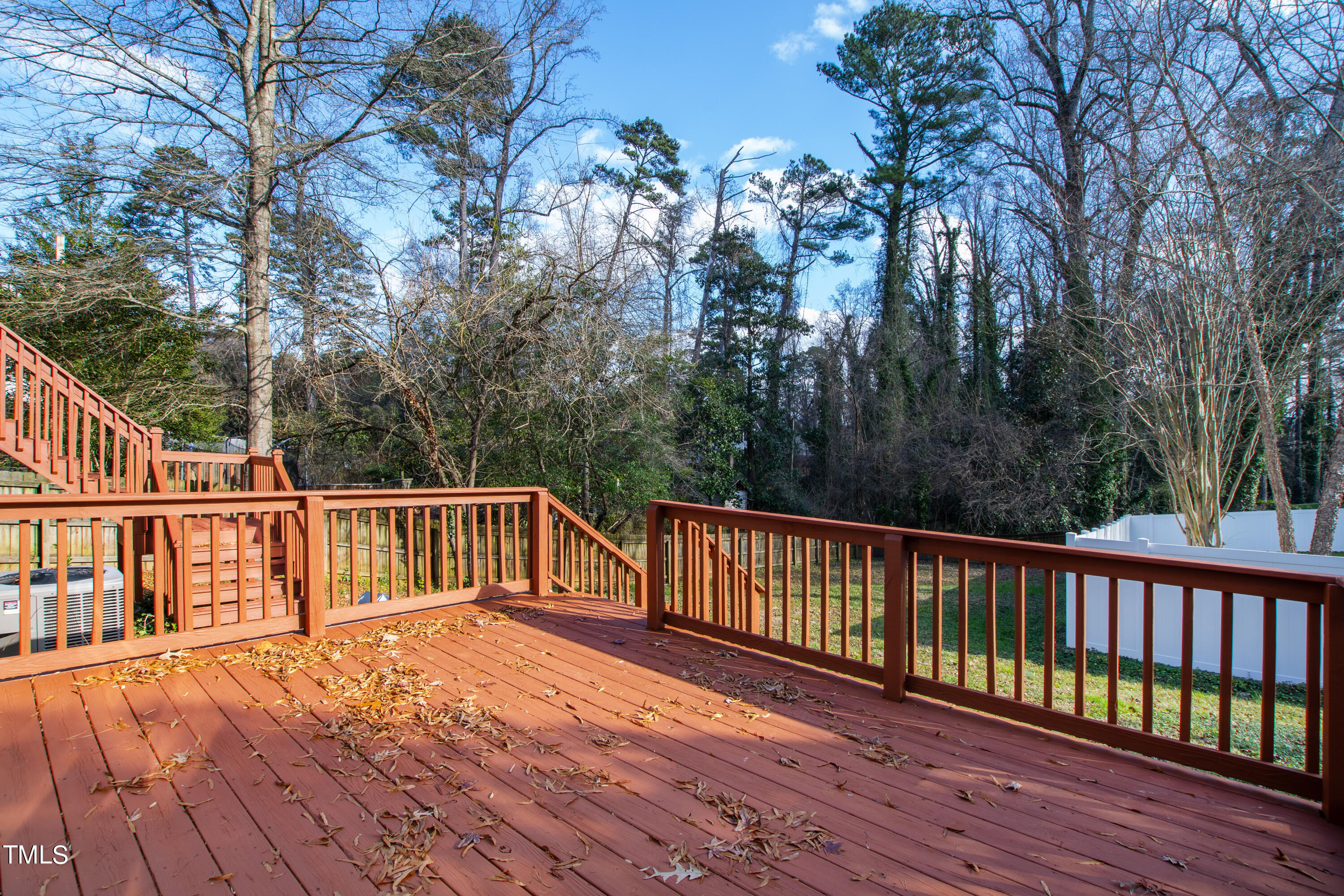 1206 Canterbury Road Raleigh, NC 27608 - Photo 35 of 37 a view of a wooden roof deck