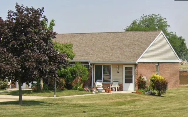 a view of a house with a swimming pool