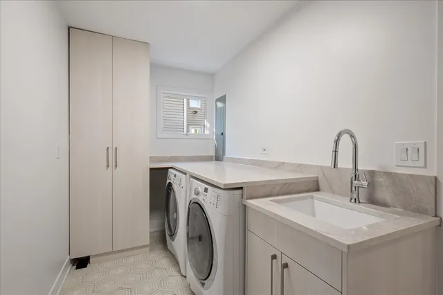 a view of a patio with couches table and chairs and potted plants
