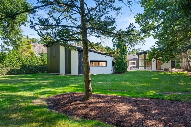 a view of outdoor space with deck and yard