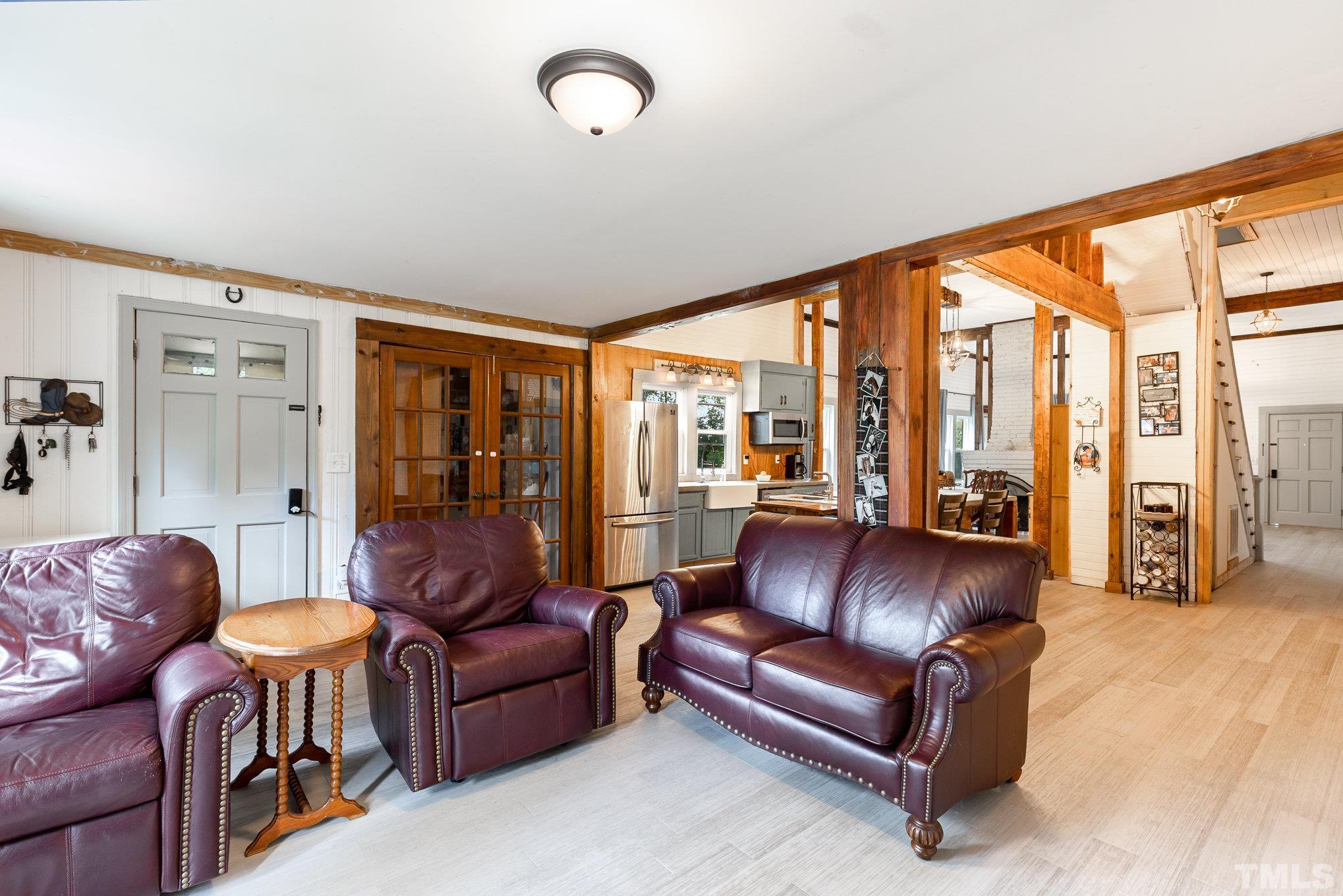 3716 Hayfield Road Wade, NC 28395 - Photo 9 of 24 a living room with furniture and a large window