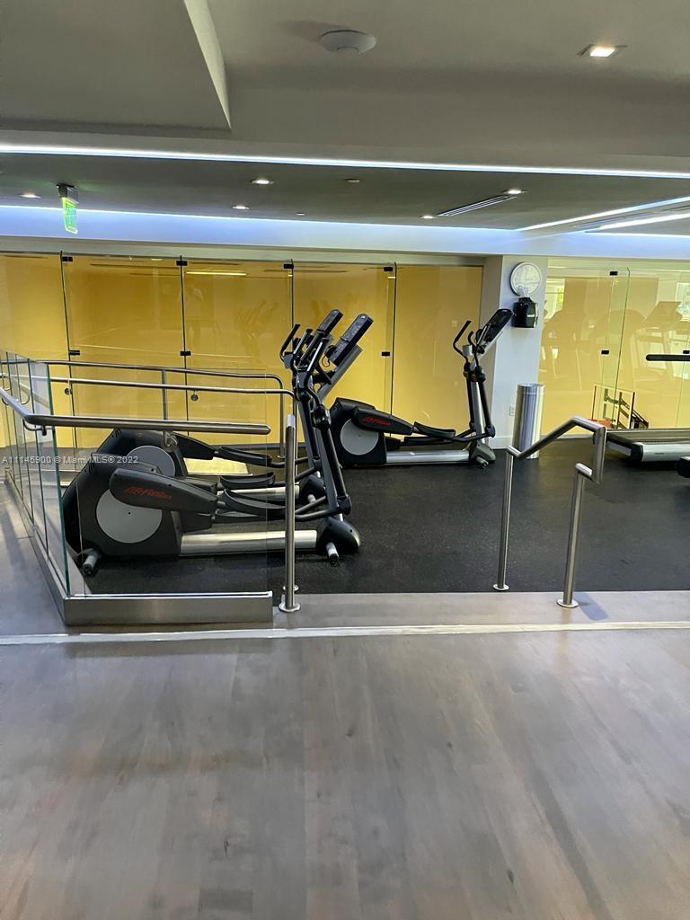 901 Brickell Key Boulevard, Unit 1005 Miami, FL 33131 - Photo 38 of 41 a view of a gym equipment