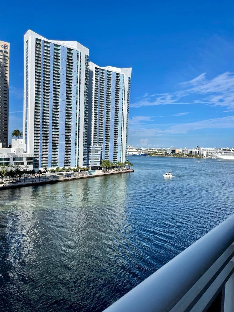 901 Brickell Key Boulevard, Unit 1005 Miami, FL 33131 - Photo 4 of 41 a view of a balcony with lake view