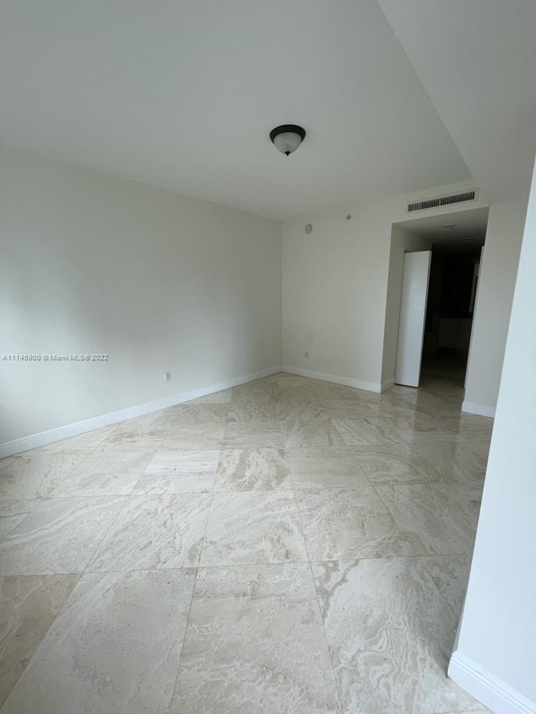 901 Brickell Key Boulevard, Unit 1005 Miami, FL 33131 - Photo 10 of 41 a view of empty room
