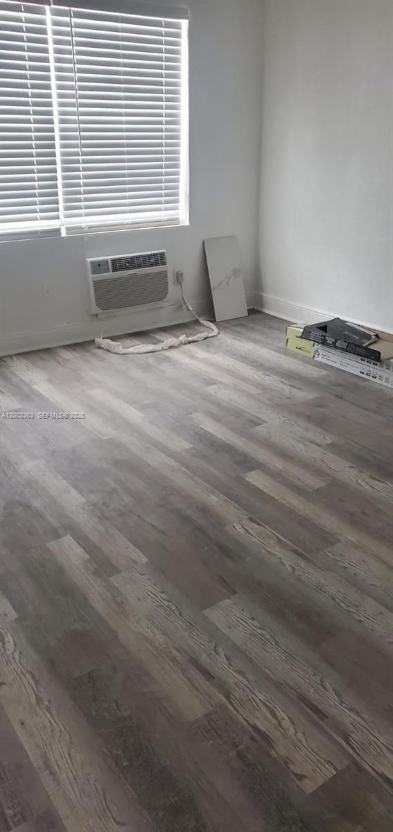 8545 Harding Avenue, Unit 5 Miami Beach, FL 33141 - Photo 6 of 10 a view of an empty room with a window