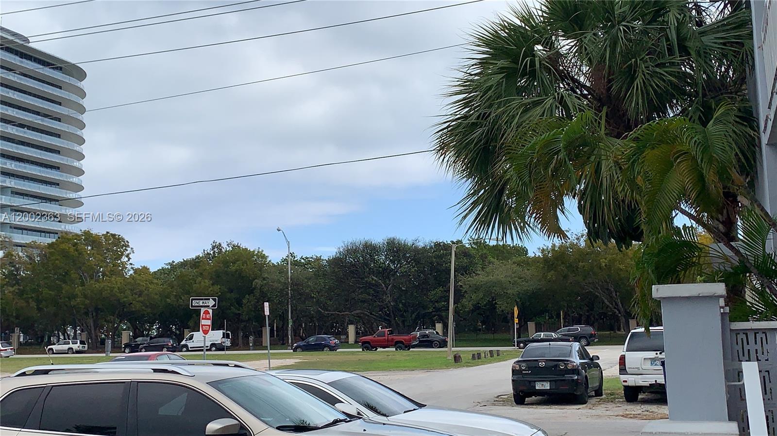 8545 Harding Avenue, Unit 5 Miami Beach, FL 33141 - Photo 10 of 10 a view of street with parked cars