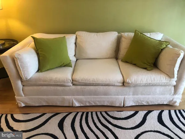 a bedroom with a bed and a cabinets