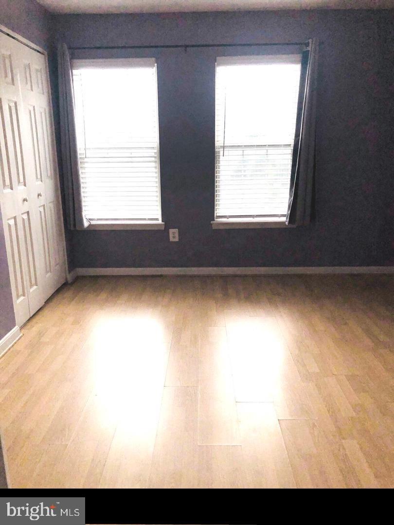 1055 Gardenview Loop, Unit 304 Woodbridge, VA 22191 - Photo 21 of 70 a view of an empty room with a window