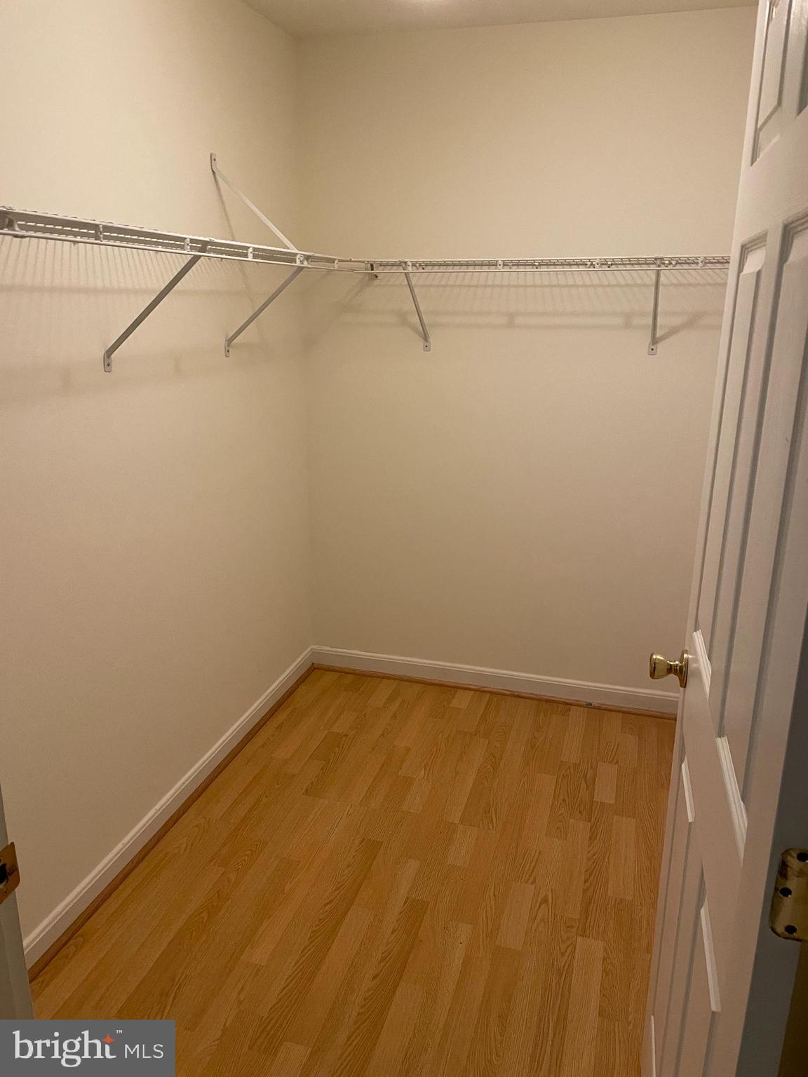 1055 Gardenview Loop, Unit 304 Woodbridge, VA 22191 - Photo 29 of 70 a view of a room with racks on the wall