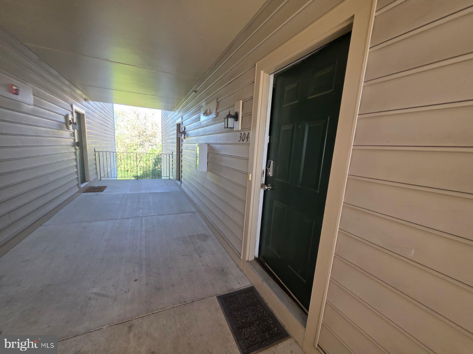 1055 Gardenview Loop, Unit 304 Woodbridge, VA 22191 - Photo 43 of 70 a view of a door of the house
