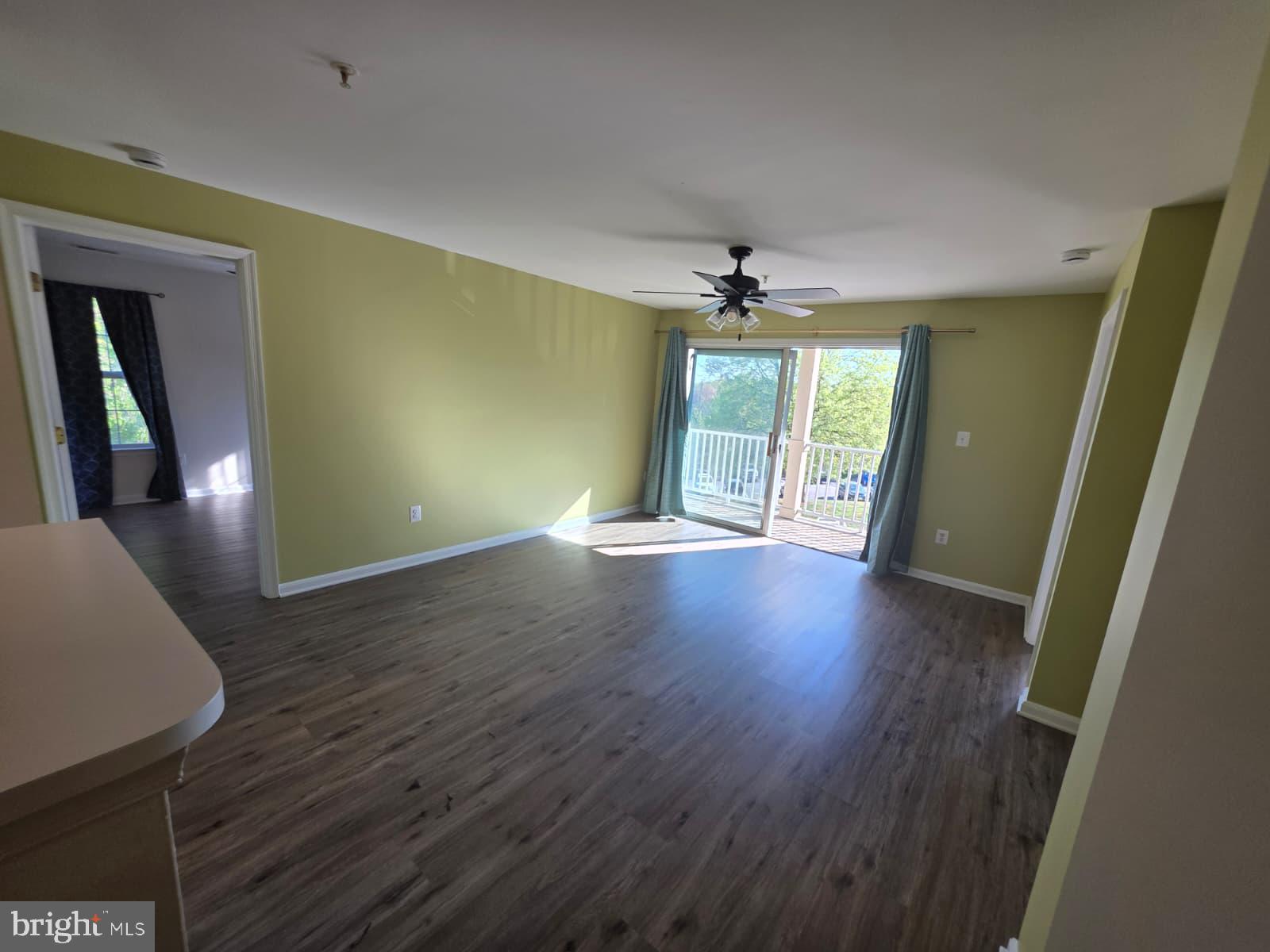 1055 Gardenview Loop, Unit 304 Woodbridge, VA 22191 - Photo 51 of 70 a view of livingroom with hardwood floor and window
