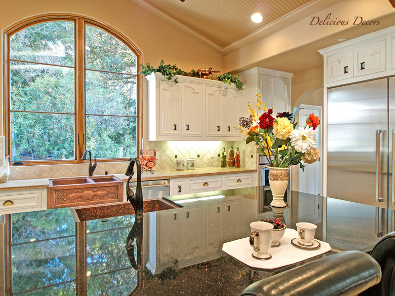 1140 High Road Santa Barbara, CA 93108 - Photo 5 of 15 a kitchen with a table and chairs in it