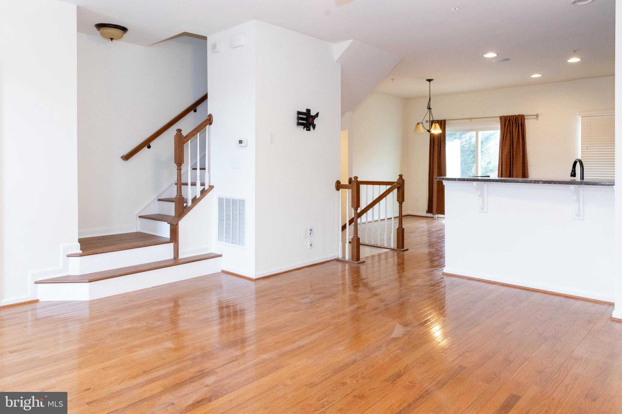 7317 Summit Rock Road Elkridge, MD 21075 - Photo 11 of 36 a view of an entryway with wooden floor