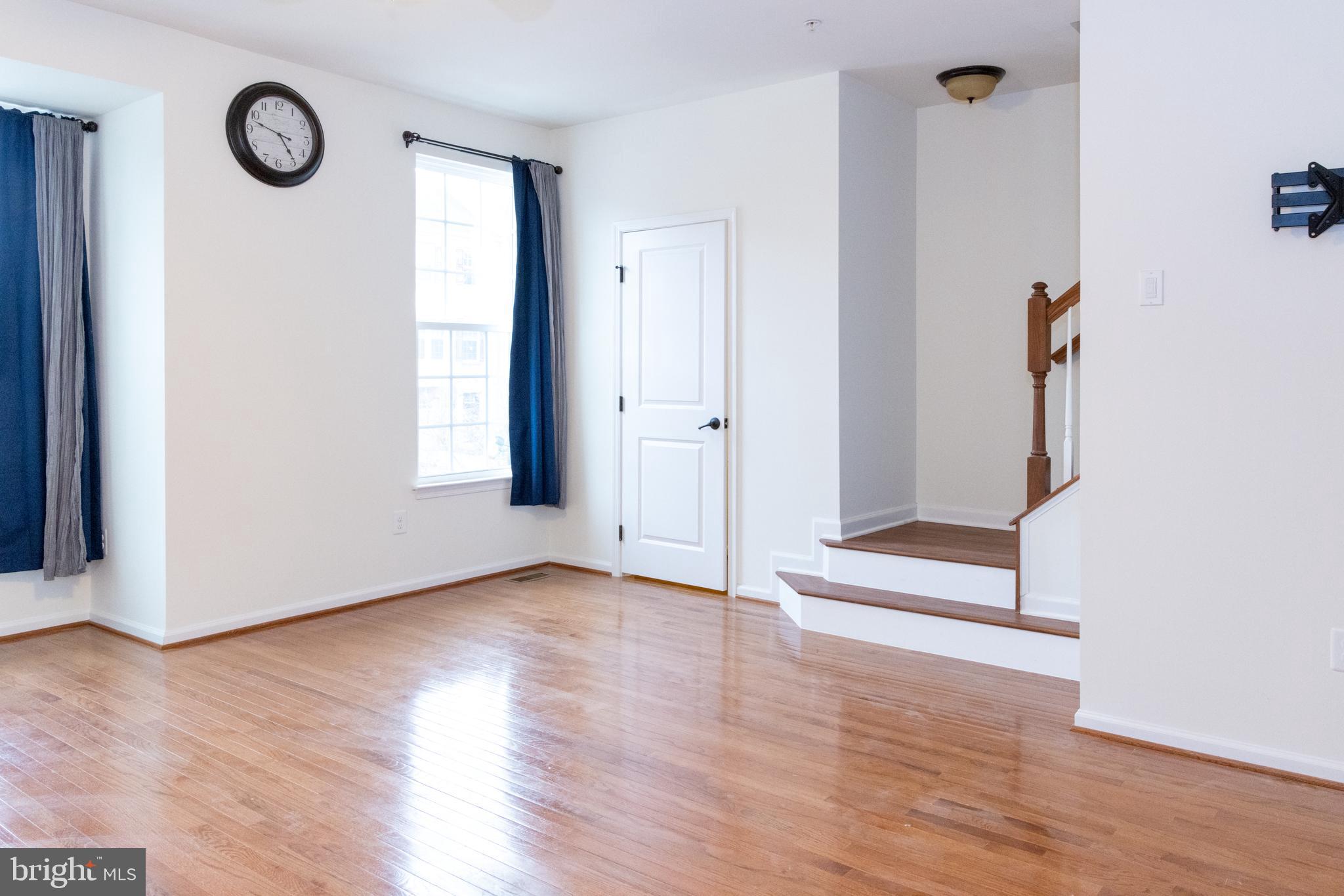 7317 Summit Rock Road Elkridge, MD 21075 - Photo 19 of 36 a view of a hallway with wooden floor