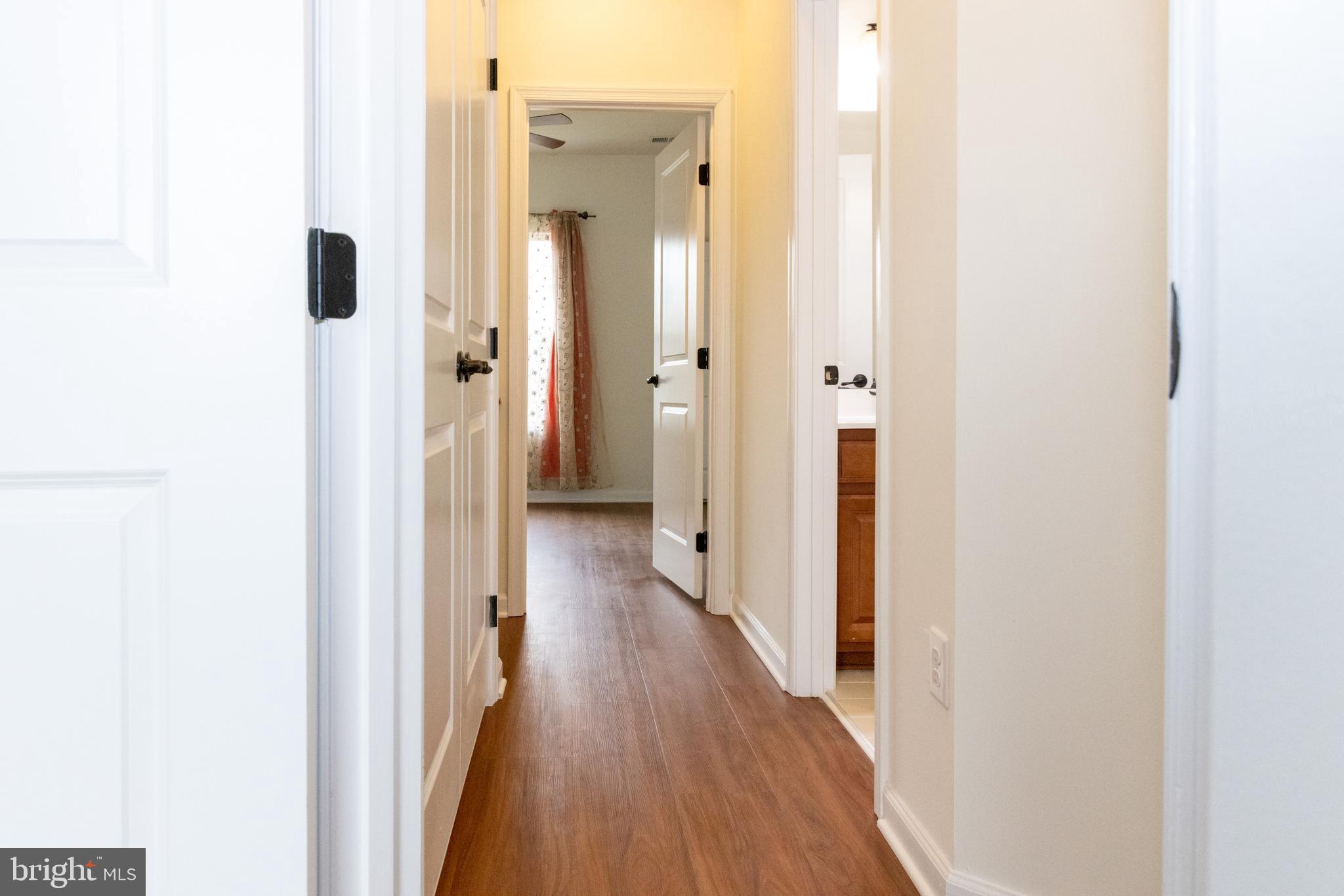 7317 Summit Rock Road Elkridge, MD 21075 - Photo 27 of 36 a view of a bathroom from a hallway