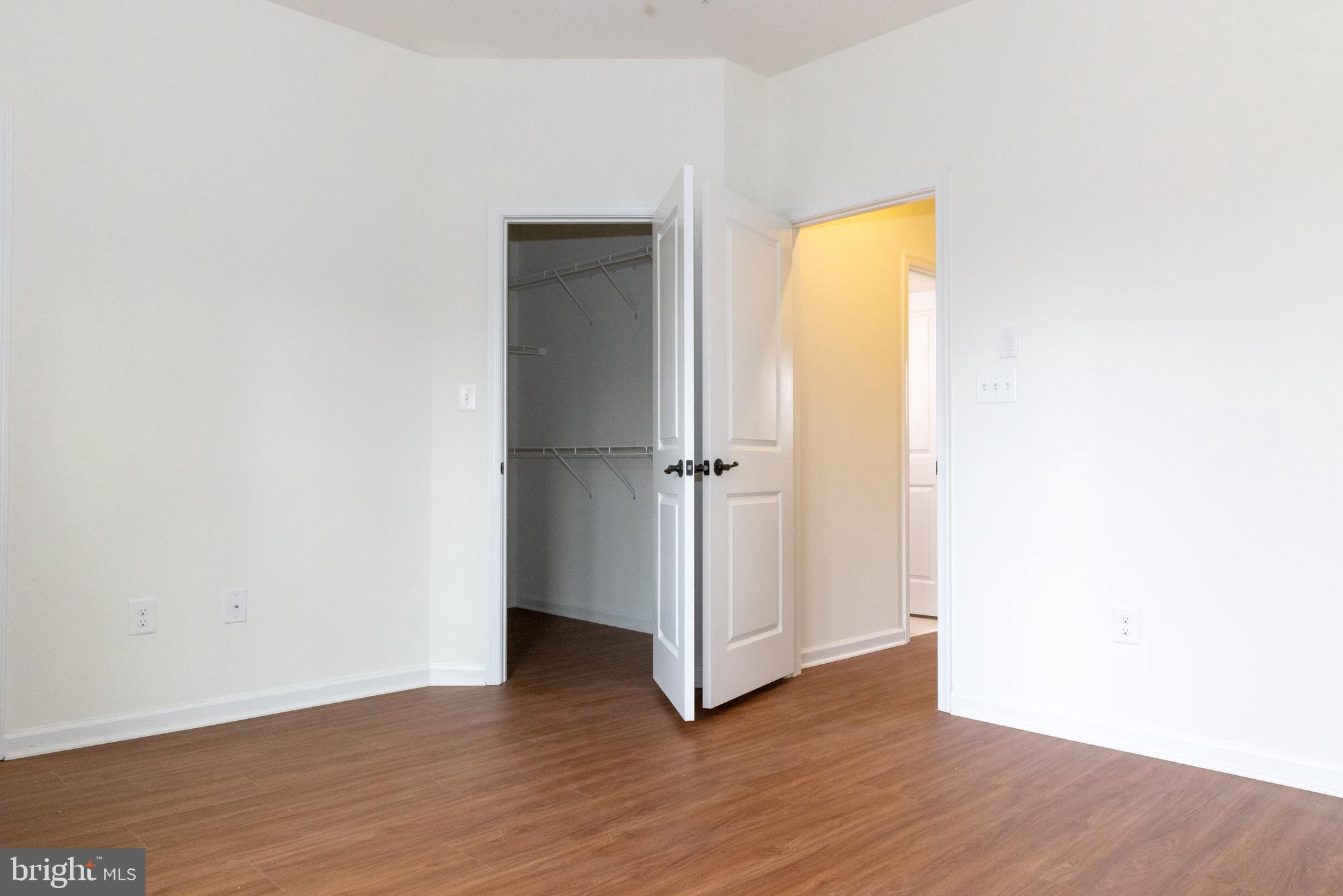 7317 Summit Rock Road Elkridge, MD 21075 - Photo 29 of 36 a view of a room with wooden floor and a wall