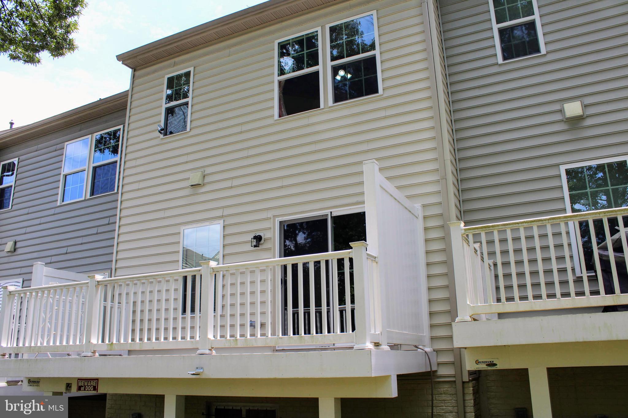 7317 Summit Rock Road Elkridge, MD 21075 - Photo 34 of 36 a view of a house with a deck