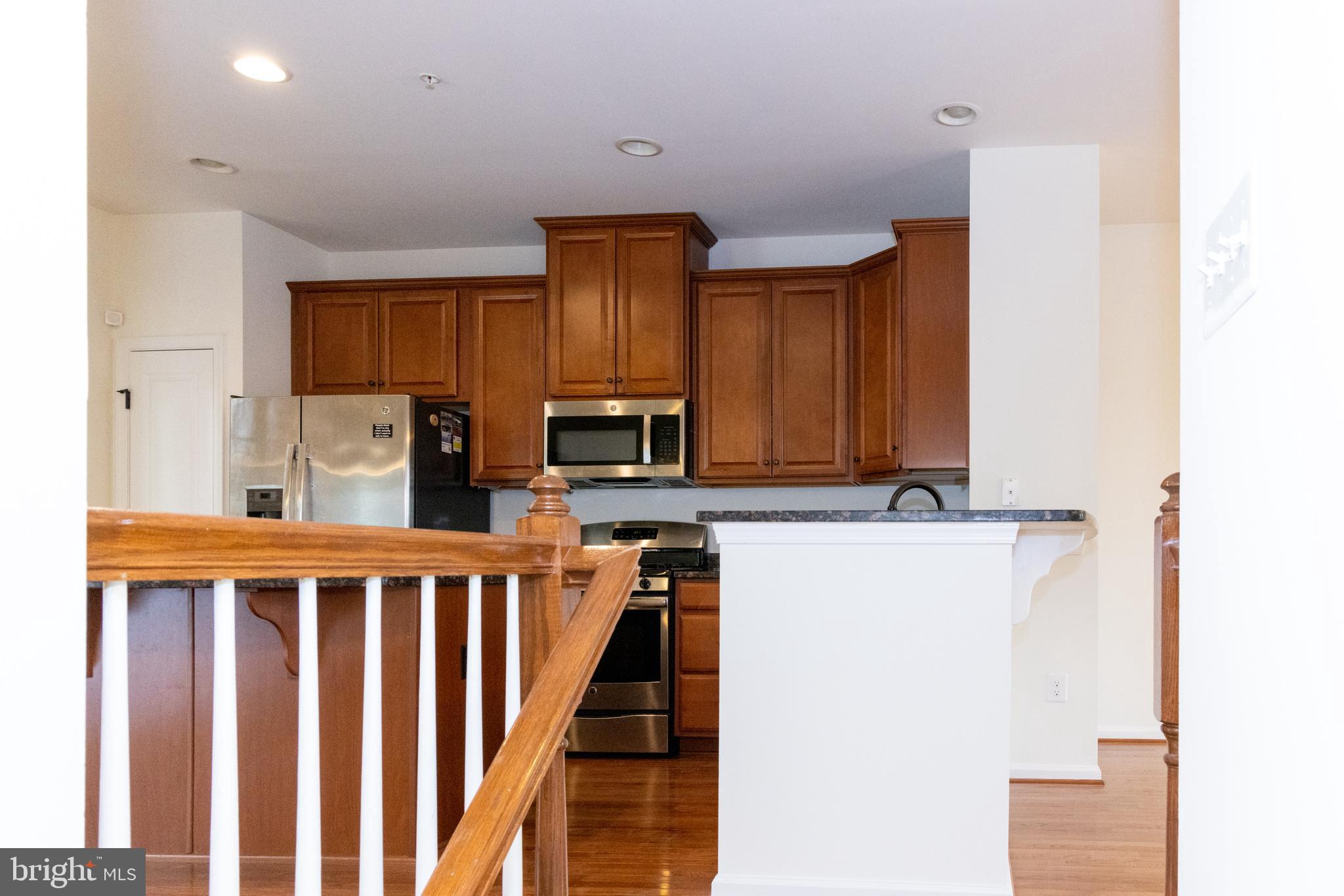 7317 Summit Rock Road Elkridge, MD 21075 - Photo 10 of 36 a view of a kitchen with electric appliances