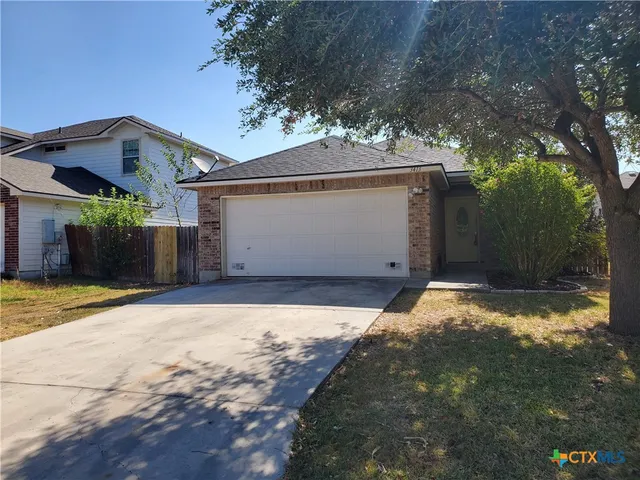 a front view of house with yard