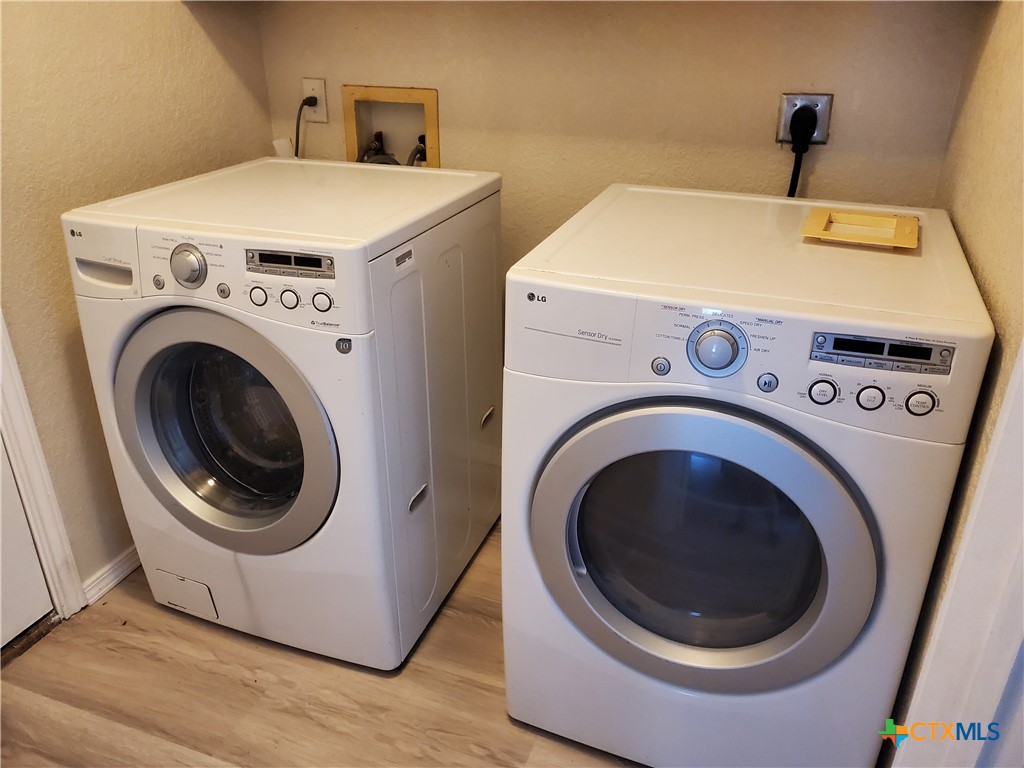 3413 Rob Roy Street Seguin, TX 78155 - Photo 12 of 13 a utility room with dryer and washer