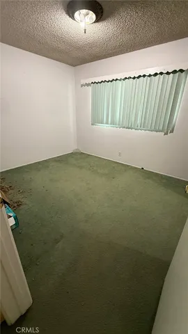 a view of a backyard of the house